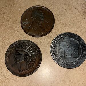 Large penny 3inches, lucky penny, and moving people William e Keenan center